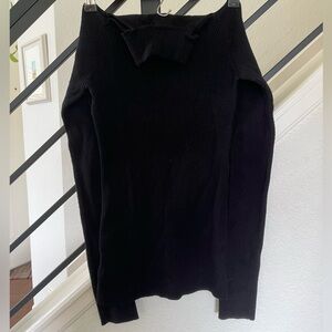 Black turtleneck sweater with shoulder cut outs